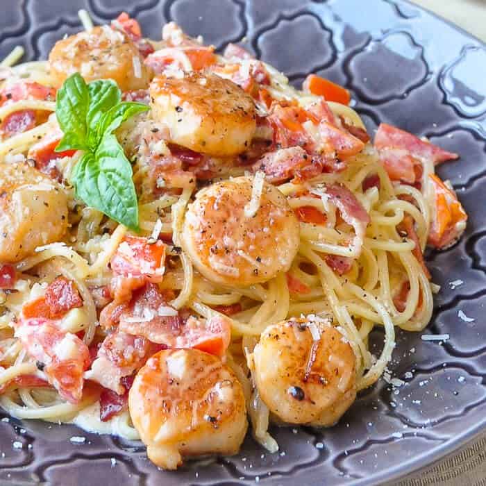 Creamy Garlic Scallops | 10 Seafood and Pasta Dinner Recipes in under 30 minutes | https://seasyourday.com – A Coastal Lifestyle Blog