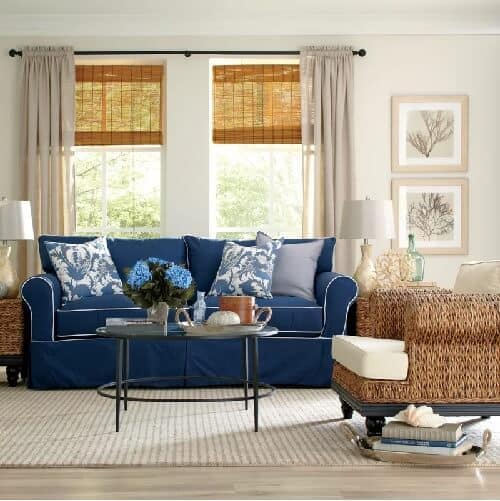 Slipcovered blue couch, Rattan Arm Chair | Coastal Farmhouse decor