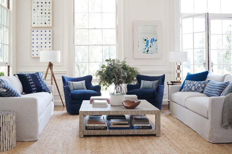Casual Elegance Coastal Room Designs and Decor Ideas "SUMMIT" Living Room Design, Blue and White, Beach casual elegance. White couch, Blue Accent Chair, large square coffee table, modern wall art. SHOP THE LOOK from Serena and Lily
(affiliate link) https://fave.co/2MPU0bM